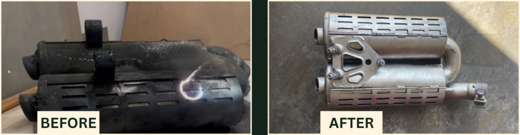 Before and after laser soot removal from a fire-damaged motorcycle exhaust in El Segundo, CA. The left side is covered in black soot; the right side is clean brushed metal.