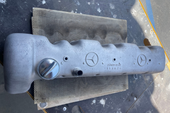 Mercedes-Benz aluminum valve cover cleaned with precision laser technology